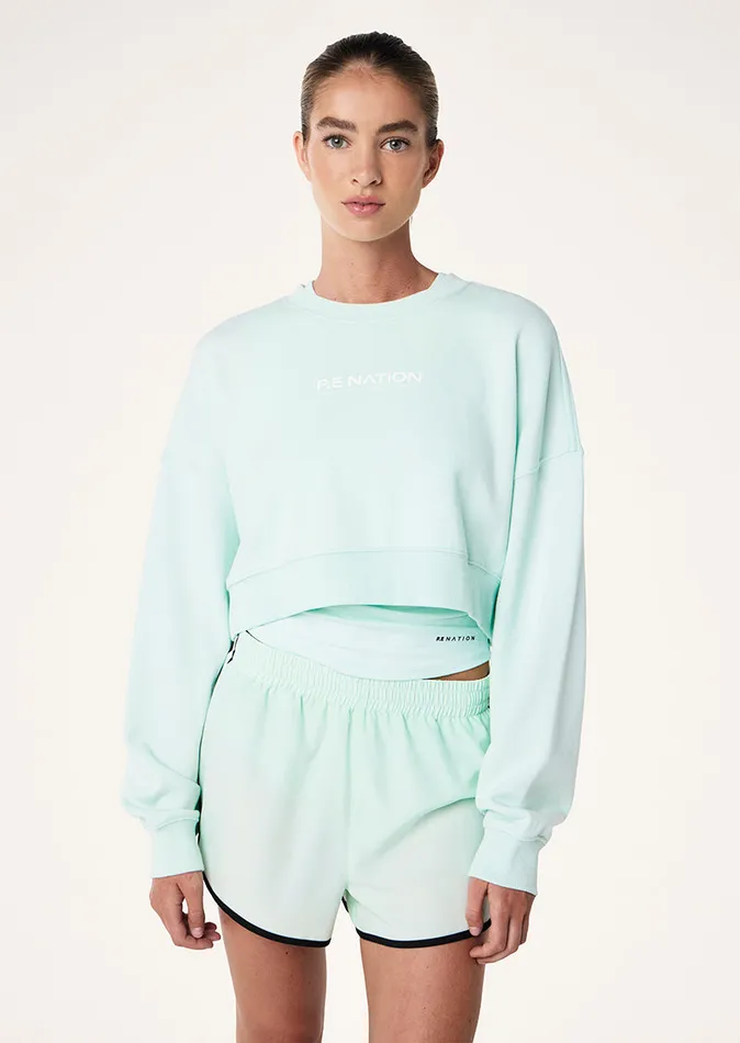 NAMEDROP CROPPED SWEAT IN HINT OF MINT Women Sweatshirts PE Nation