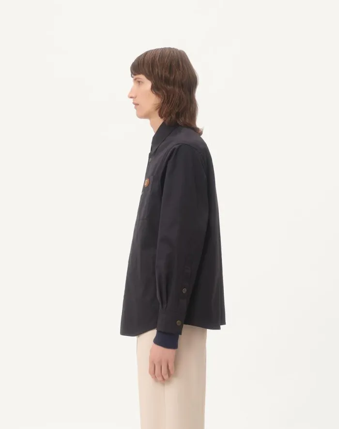 Valentino Outerwear Man Nylon Shirt Jacket With Rubberized V Detail For Man In Stone Stone Valentino Outerwear Man Nylon Shirt Jacket With Rubberized V Detail For Man In Stone Stone