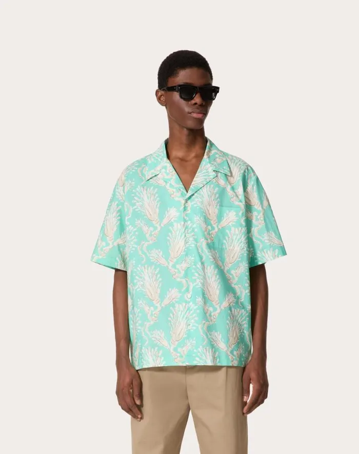 Valentino Shirts Man Cotton Poplin Bowling Shirt With Metamorphos Wheatsheaf Print For Man In Turquoisebeige Turquoisebeige Valentino Shirts Man Cotton Poplin Bowling Shirt With Metamorphos Wheatsheaf Print For Man In Turquoisebeige Turquoisebeige