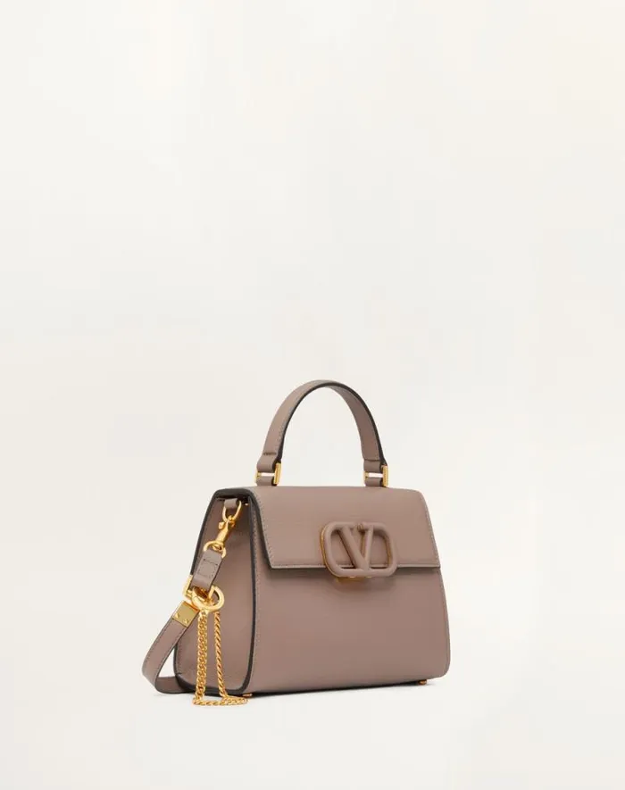 Valentino Top Handle Bags Woman Small Vsling Grainy Calfskin Handbag For Woman In Clayrose Quartz Clayrose Quartz Valentino Top Handle Bags Woman Small Vsling Grainy Calfskin Handbag For Woman In Clayrose Quartz Clayrose Quartz